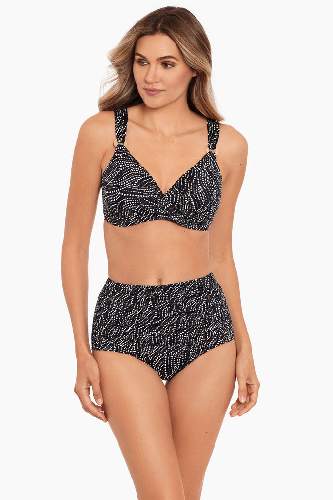 Woman in a two piece swim suit.