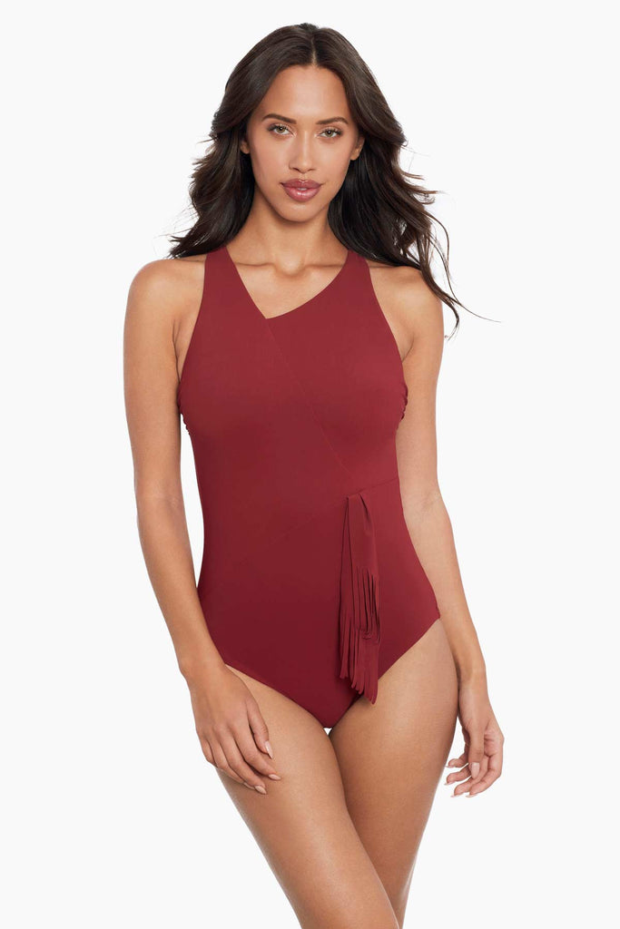 Woman wearing a amoressa one piece swim suit.