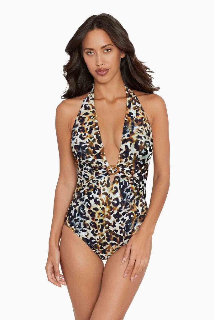 Woman wearing a one piece swim dress.