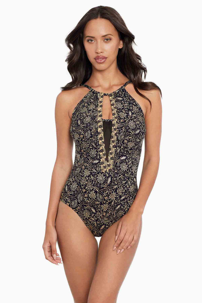Girl in a one piece swim suit.