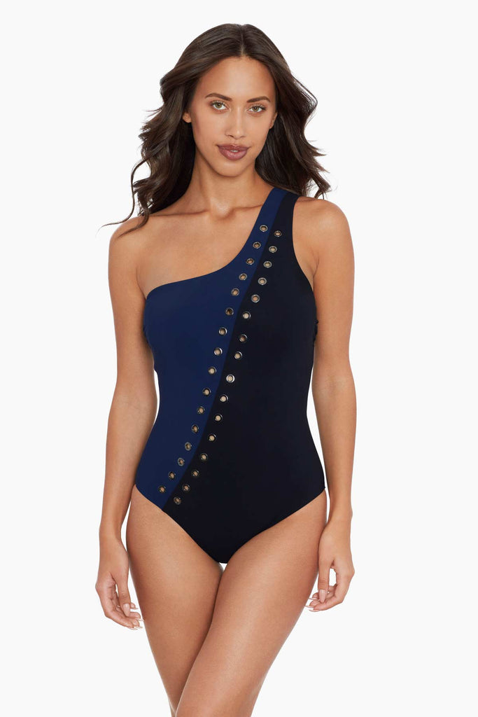 Woman in a stylish one piece swim suit.