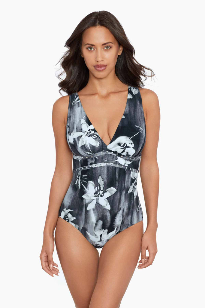 Woman in a amoressa swim suit.