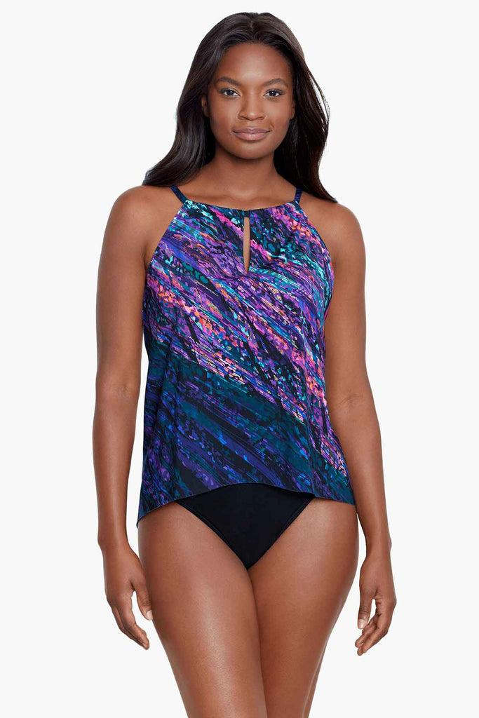 An african american woman wearing a tankini top.