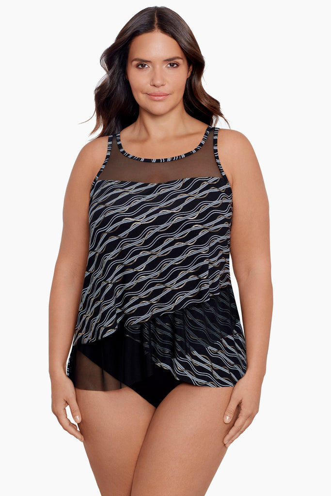 A young woman in a slimming tankini top.